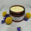 Rich texture of After Sun Body Cream with daisy pom poms, perfect for sunburn relief