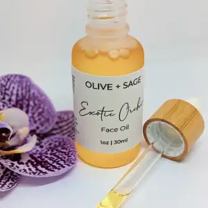 Exotic Orchid Face Oil in dropper bottle with orchid flower – Calming, brightening, and anti-aging organic face oil.