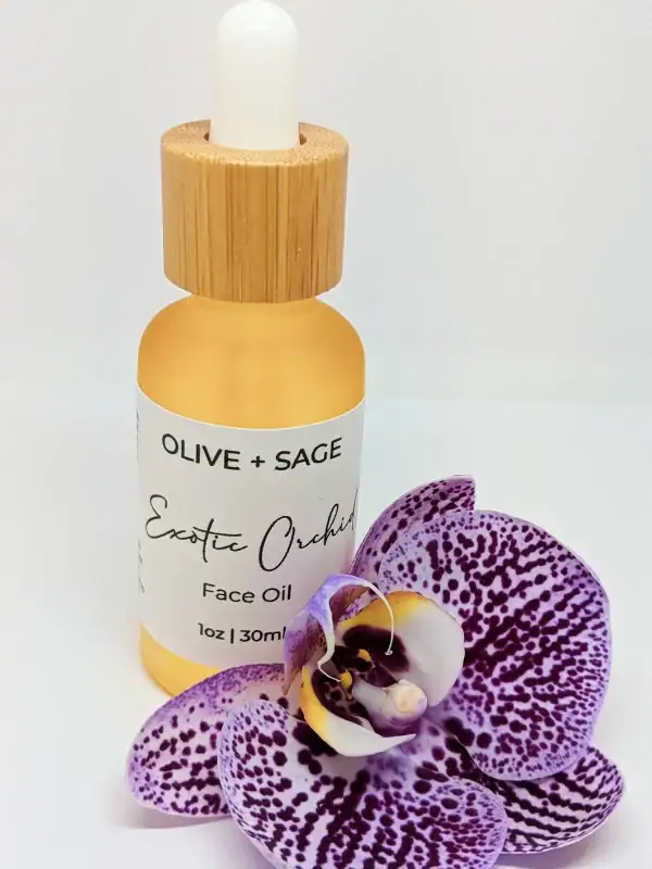 Exotic Orchid Face Oil in closed dropper bottle with orchid flower – Organic, hydrating, and anti-aging skincare