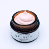 Lychee Rose Face Cream in glass jar, showing texture – moisturizing and hydrating skin with organic ingredients.