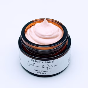 Lychee Rose Face Cream in glass jar, showing texture – moisturizing and hydrating skin with organic ingredients.