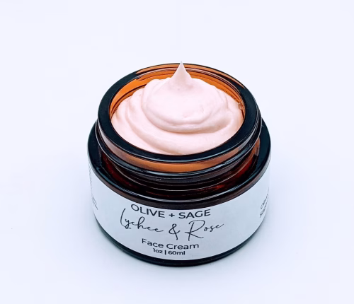 Lychee Rose Face Cream in glass jar, showing texture – moisturizing and hydrating skin with organic ingredients.