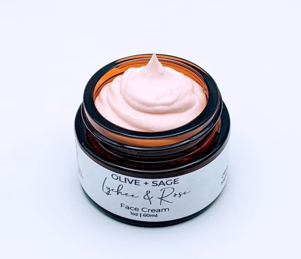 Lychee Rose Face Cream in glass jar, showing texture – moisturizing and hydrating skin with organic ingredients.
