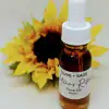 Angled view of Nature’s Retinol Face Oil with dropper in bottle. Clean aesthetic with soft light and natural tones.