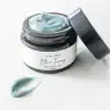 Organic Blue Tansy Moisturizer smear showing smooth texture and botanical-rich consistency.