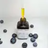 Organic Blueberry Face Oil serum with antioxidant-rich blueberries and goji berries for hydrating, brightening, and rejuvenating the skin.