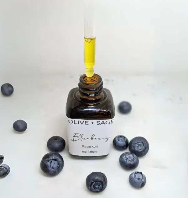Organic Blueberry Face Oil serum with antioxidant-rich blueberries and goji berries for hydrating, brightening, and rejuvenating the skin.