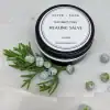 Organic Boo Boo Salve in a tin with the lid on, featuring the product name and logo.