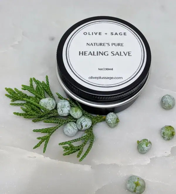 Organic Boo Boo Salve in a tin with the lid on, featuring the product name and logo.