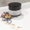 Glass jar of rosacea face cream for gentle hydration—supports red, dry, and sensitive skin.