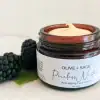 glass jar of pore minimizing face cream showing smooth, whipped texture