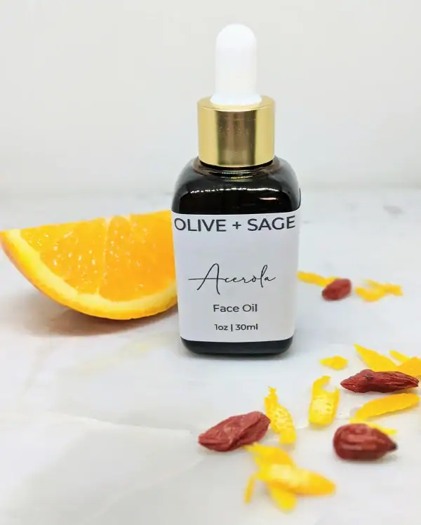 Glass dropper bottle of Vitamin C Face Oil with orange slices – glow-boosting, natural skincare