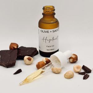 Hazelnut oil for skin – organic face oil dropper styled with cocoa and raw hazelnuts