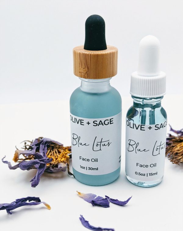 Blue Lotus Face Oil 1 oz and 0.5 oz glass bottles with blue lotus flowers, natural facial oils for hydration and skin calm