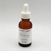 Organic Recovery Face Oil dropper bottle with minimalist label.