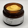 Organic Recovery Face Cream moisturizer in amber jar with whipped texture
