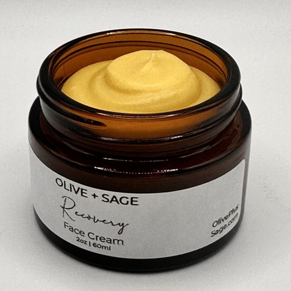 Organic Recovery Face Cream moisturizer in amber jar with whipped texture
