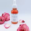 Luxury botanical rose face oil by Olive + Sage for radiant glowing skin