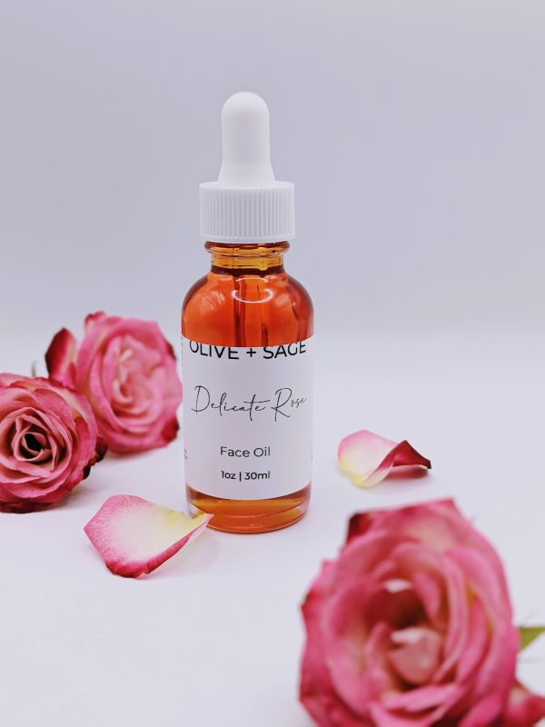 Delicate Rose Face Oil bottle with natural roses and petals