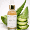 Aloe Plus Hydrating Serum bottle with fresh aloe vera leaves
